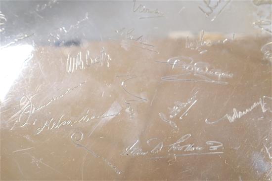 A large silver shaped circular salver, engraved with signatures, Frank Hawker Ltd, Birmingham, 1957, 54 oz.